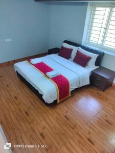 Voodi või voodid majutusasutuse JK - 4 BHK Villa toas