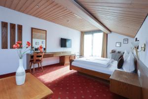 Postel nebo postele na pokoji v ubytování Arthotel Ana Panorama + 37 fotografií