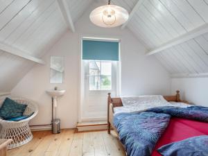 Katil atau katil-katil dalam bilik di Holiday Home Dijkhuisje by Interhome