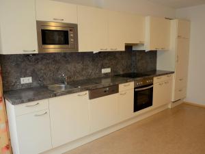 Kuchyňa alebo kuchynka v ubytovaní Apartment Georg by Interhome