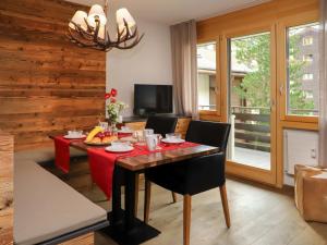 TV a/nebo společenská místnost v ubytování Apartment Papillon by Interhome