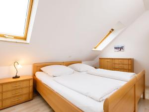En eller flere senge i et værelse på Holiday Home Conny by Interhome