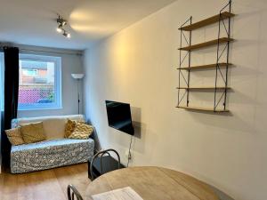 Area tempat duduk di Pass the Keys Charming Guest House in St Albans with Parking