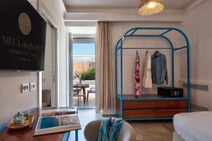 a room with a display case in a room at GOCCE VILLAS - Villa Degli Dei Scirocco in Vico Equense