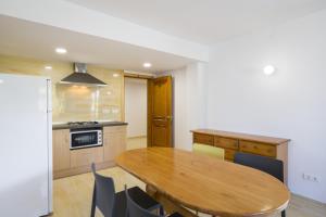 Kuchyň nebo kuchyňský kout v ubytování Apartamentos Zodiac