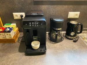 Příslušenství pro přípravu čaje a kávy v ubytování ANSEL Villa