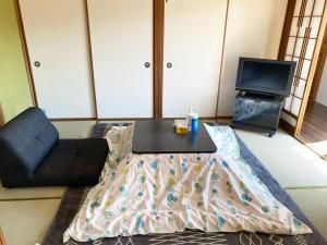 Letto o letti in una camera di 鉄道と山の見える家