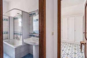 a bathroom with a tub and a sink and a bath tub at Campanella Villas Gardens Pool Superview in Termini +42 photos