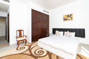 Postel nebo postele na pokoji v ubytování Luxury 5B Villa private Garden in Ras Al Khaimah