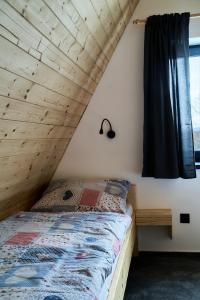 Postel nebo postele na pokoji v ubytování Resort Bobrovník