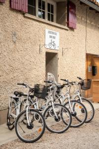 a group of bikes parked in front of a building at Camping Fargogne in Puygaillard-de-Quercy