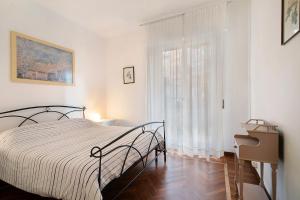 Postel nebo postele na pokoji v ubytování La Casa di Carla