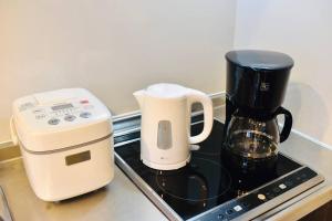 Set per la preparazione di tè e caffè presso NEW!! 浅草 スカイツリー近く 貸切最大5人 東京観光に最適 無料WiFi