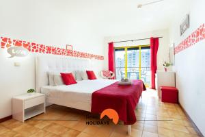 Postel nebo postele na pokoji v ubytování #150 Praia da Rocha by Home Holidays + 40 fotografií