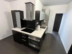 Kuchyň nebo kuchyňský kout v ubytování Stella Apartment