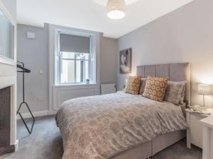 En eller flere senge i et værelse på 1 Bed in Cockermouth 83084