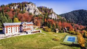 an aerial view of a house in the mountains at Hotel Malina*** in Ružomberok