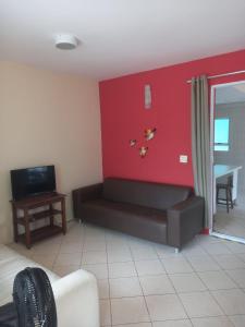 Μια τηλεόραση ή/και κέντρο ψυχαγωγίας στο SOBRADO-BERTIOGA-Uso exclusivo para grupos de até 12 pessoas em 1 até 4 suítes