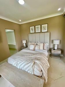 Postel nebo postele na pokoji v ubytování Catalina de luxe inclusief elektra water internet tv wifi