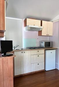 Kuchyň nebo kuchyňský kout v ubytování Bungalows Zaragoza Camping