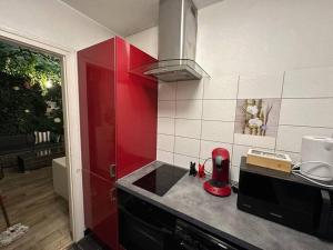 Η κουζίνα ή μικρή κουζίνα στο The Jungle SPA Strasbourg