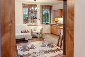 Posteľ alebo postele v izbe v ubytovaní Apartament Karpielówka View Od-nowa