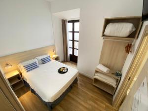 a bedroom with a large bed in a room at Hostel Casa Vargas Figueroa in Cáceres +63 photos