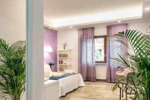 Posteľ alebo postele v izbe v ubytovaní GOCCE VILLAS - Dimoria Aster Apartment + 4 fotografie