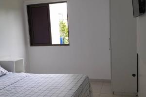 Postel nebo postele na pokoji v ubytování Flat no Carneiros Beach Resort