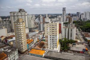an aerial view of a city with tall buildings at Studio no centro de Curitiba in Curitiba