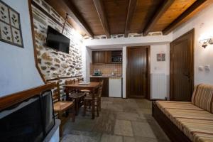 A television and/or entertainment centre at Archontiko Michael Pelion