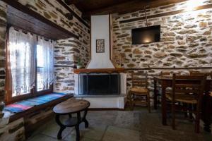 A television and/or entertainment centre at Archontiko Michael Pelion