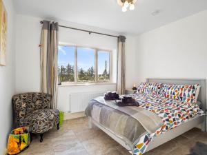 Кровать или кровати в номере Teach Eile, Clifden