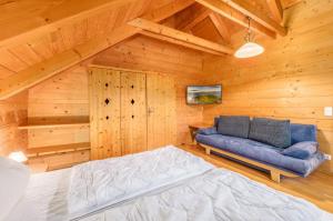 Letto o letti in una camera di Chalet Dachsteinblick