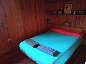 Postel nebo postele na pokoji v ubytování Casa de Madera