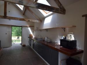 a kitchen with a sink and a counter top at 1 bed in Coreley CHL32 in Coreley