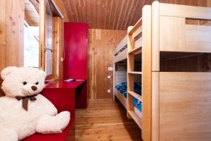 Postel nebo postele na pokoji v ubytování Camping Le Lac des Sapins