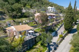 an aerial view of a house in a village at Kerasia Villas - 4 apartments & cottage in (( Kerasá ))