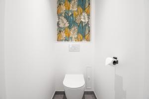 Ванна кімната в L'Appartement des Ducs avec Baignoire Double