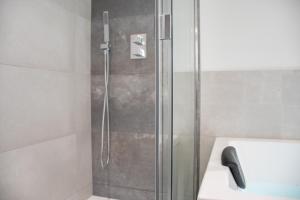 Kúpeľňa v ubytovaní L'Appartement des Ducs avec Baignoire Double