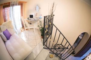 an overhead view of a living room with a staircase at Luxury Domus in Rome