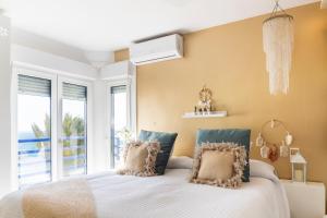 Posteľ alebo postele v izbe v ubytovaní Ocean Views, Paseo Marítimo