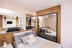 Et tv og/eller underholdning på Studio Luxo ON São Mateus com ar / igreja próx shopping Independência