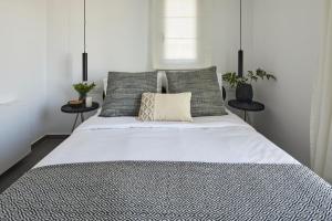 Postel nebo postele na pokoji v ubytování EPICENTER LUXURY RESIDENCE