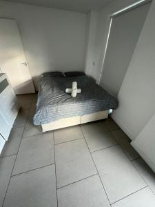 Ένα ή περισσότερα κρεβάτια σε δωμάτιο στο Two bed in Clapham