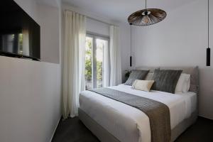 Postel nebo postele na pokoji v ubytování EPICENTER LUXURY RESIDENCE
