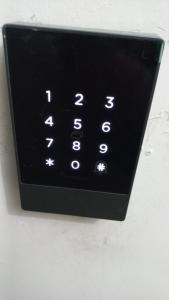 a close up of a black remote control at Click & Room in Torremolinos