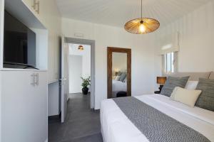 Postel nebo postele na pokoji v ubytování EPICENTER LUXURY RESIDENCE