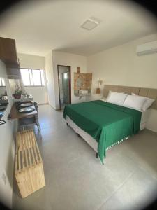 Flor de Cacto Beach Home客房内的一张或多张床位