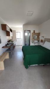 Flor de Cacto Beach Home客房内的一张或多张床位